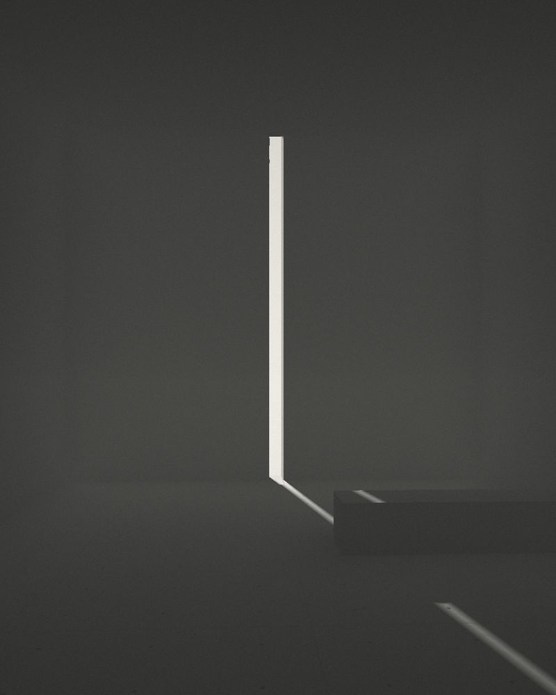 Fente de lumière dans un mur de béton, intérieur sombre